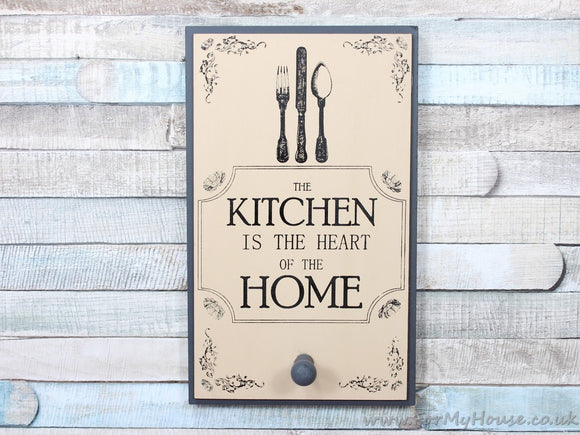Kitchen is the heart of the home grey/cream apron coat hook