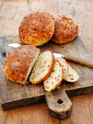 These sausage, ham, and cheese loaves are a hearty, traditional Portuguese bread, that is made with presunto, chouriço, and semi-firm sheep’s milk cheese