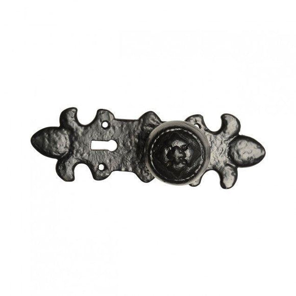 Coptic Round Rustic Door Knob On Fleur De Lys Plate Antique Black Iron · Kirkpatrick 1212 ·